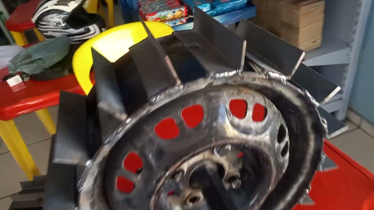 fazendo uma roda ferro para o tratorito husquvana tf 338 usando roda 13 gol