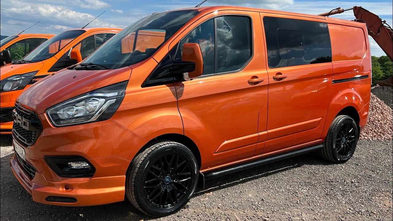 Orange glow ford transit custom crewcab