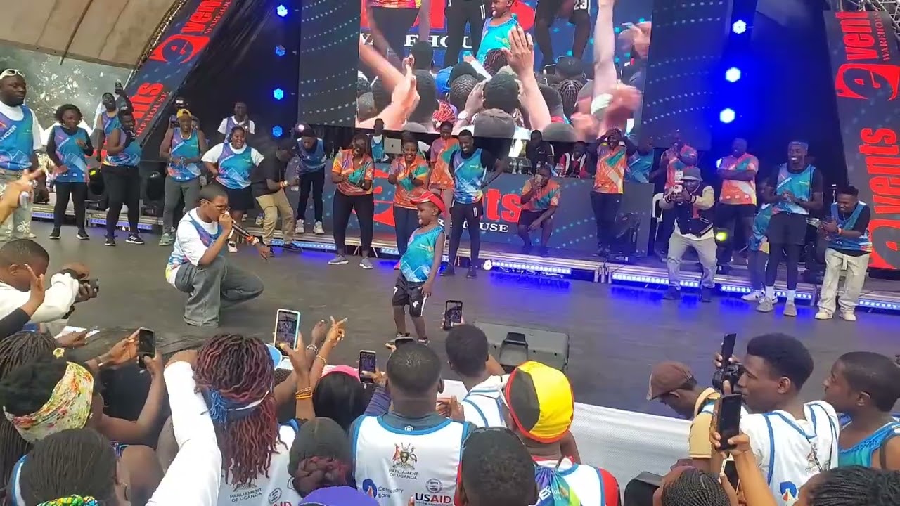 KASESE GIANT KILLS IT ON STAGE WITH DAD 