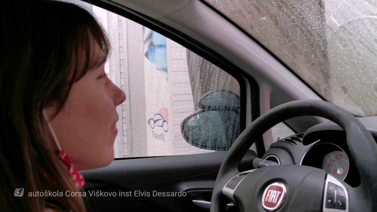 (4K UHD) Driving school. Drive through car wash machine