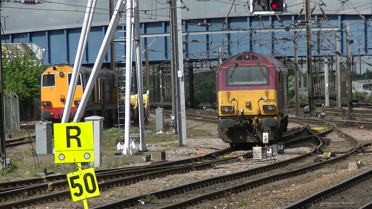 EWS 66133 rescuing 67024 at Doncaster