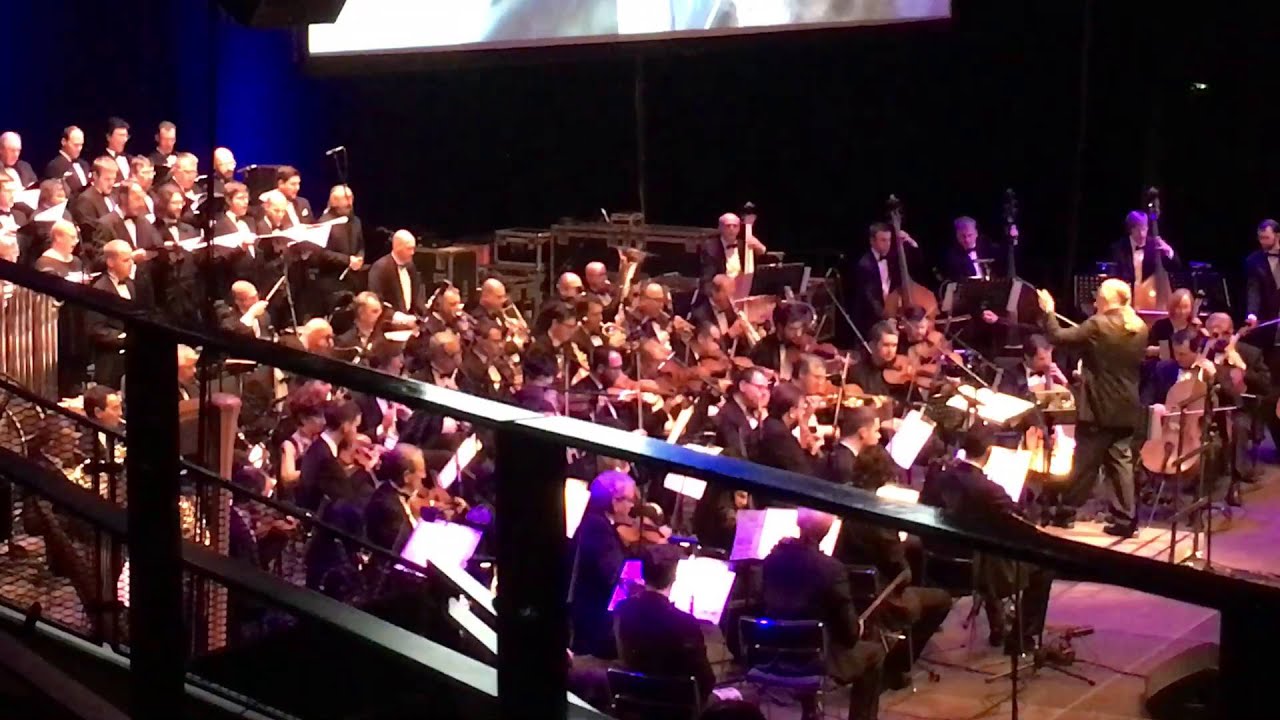 Nobuo Uematsu SINGS One Winged Angel with the chorus. AWESOME!!!