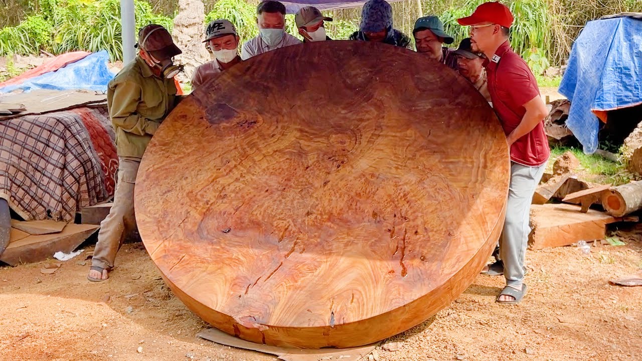 From Monster Log To Masterpiece  7 Strong Men Build The World’s Largest 500-Year-Old Wooden Table