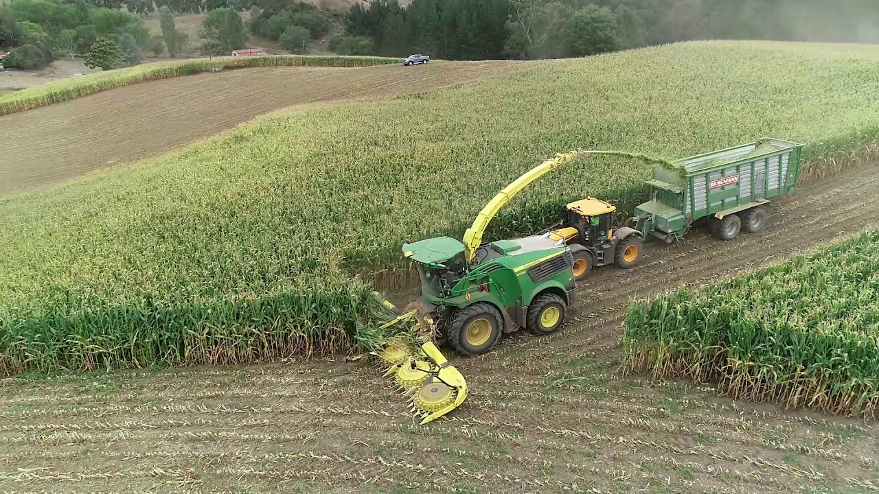 John Deere 9700i Forage Harvester with Bergmann & Herron Maize Trailers
