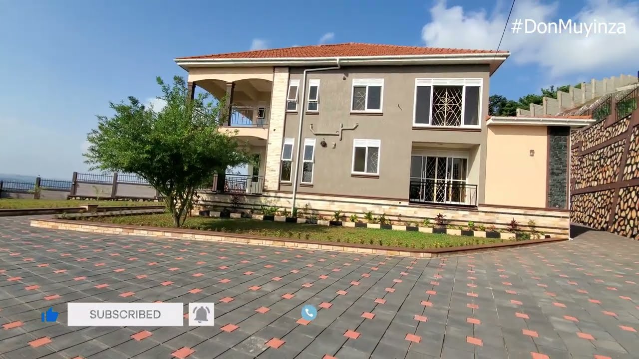 Touring a 5 bedroom house at Bwebajja Entebbe road Uganda at $700,000 USD