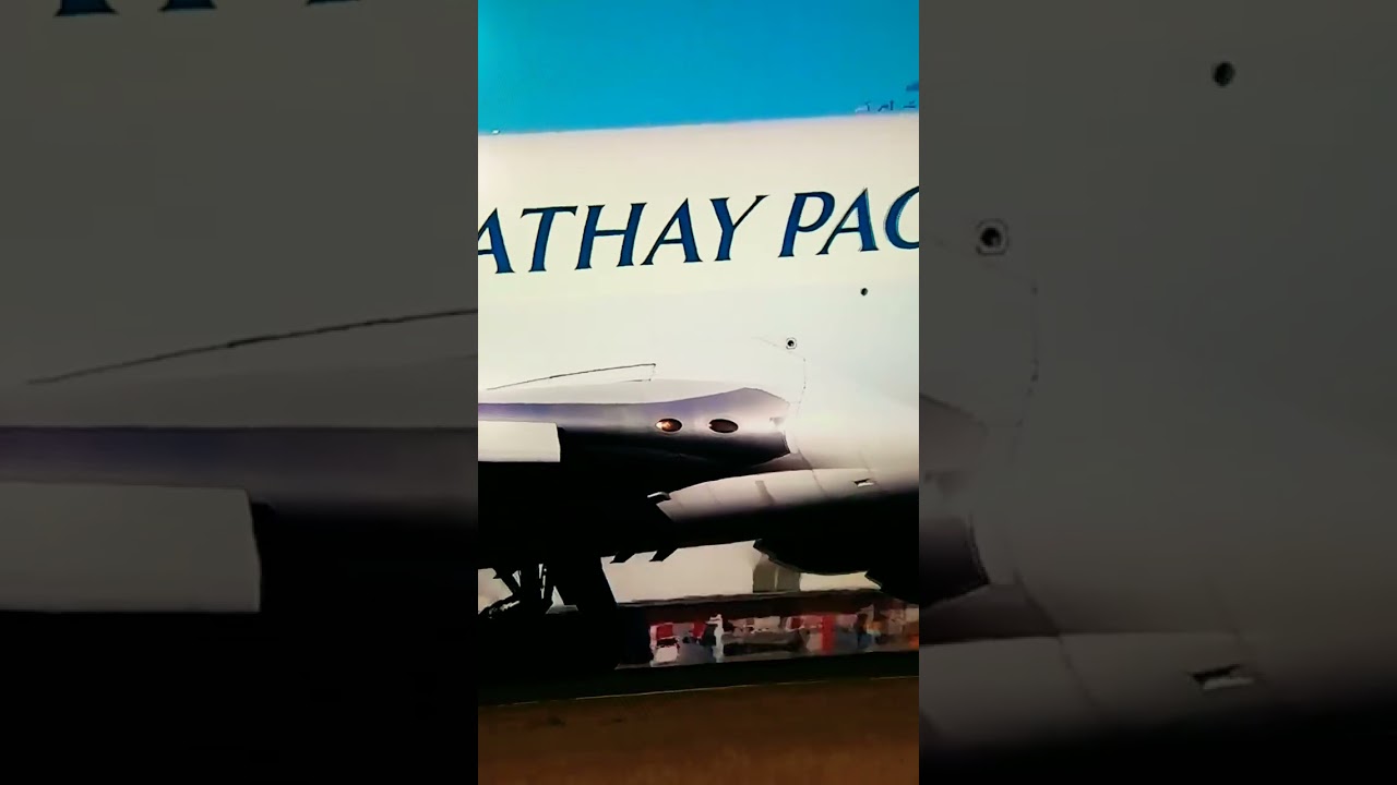 CATHAY PACIFIC AIRLINES IS TAKING OFF AT THE MELBOURNE AIRPORT IN AUSTRALIA