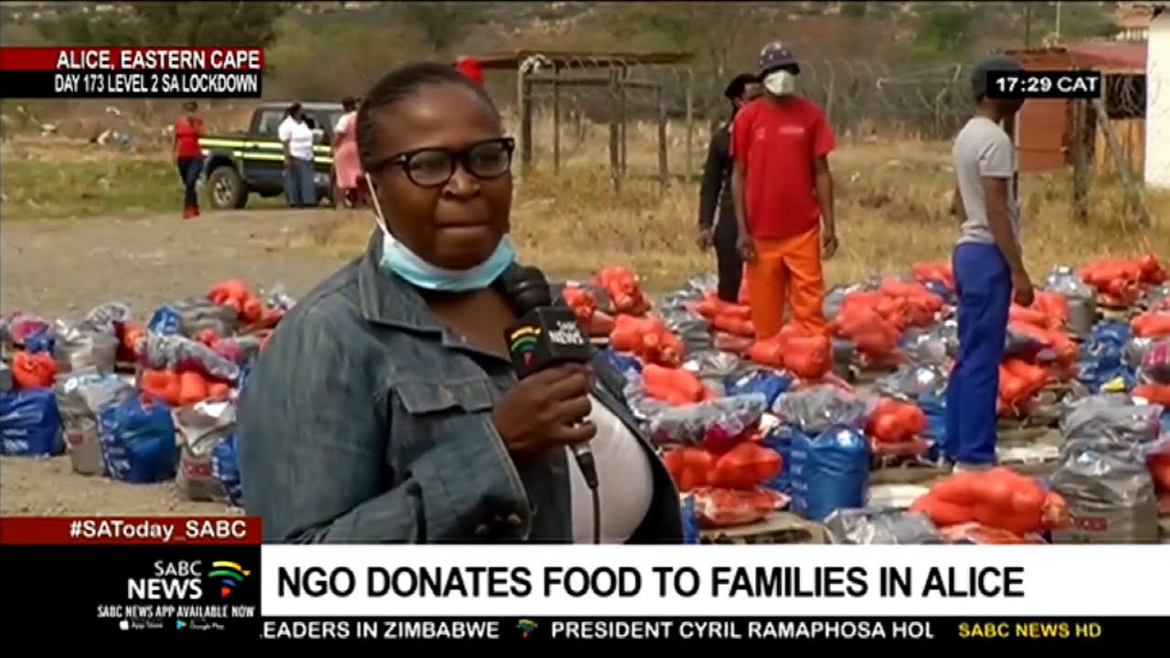 Destitute families in Alice receive food donations from NGO