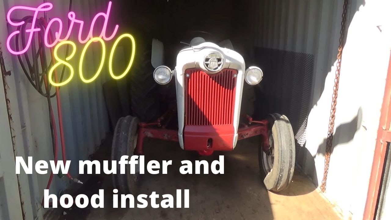 Ford 800 Exhaust change and hood button up..Again something happened to the engine