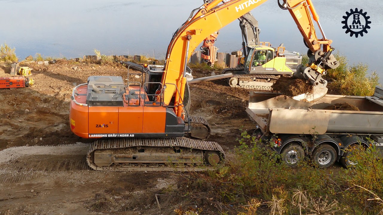 Hitachi ZX300LC with Engcon EC233 Loading Volvo FH16-750 and MB trucks