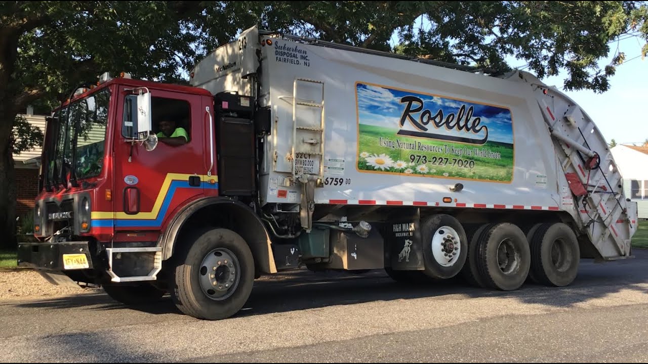 Roselle Suburban Disposal Mack MRU McNeilus Rear Loader Garbage Truck Packing Beach Garbage