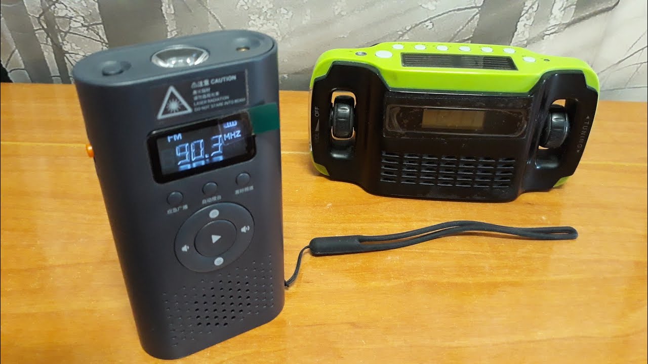 Tecnología - 24 -  Radio/ Power Bank de dinamo con linterna, puntero láser y alarma de 80 decibelios