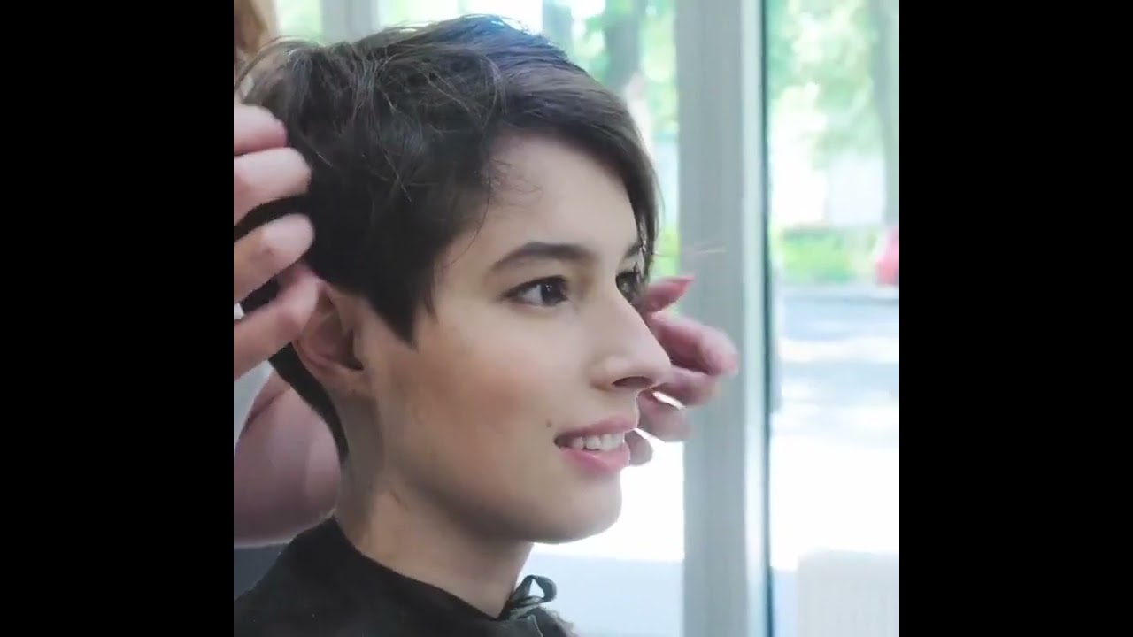Long hair chopped off to a pixie