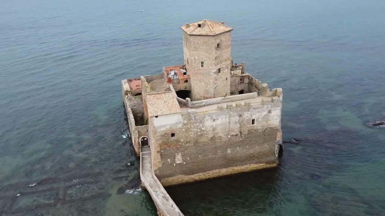 Torre Astura. A small Fort surrounded by the Sea.  Ruins under the water. DRONE- Torre Astura - ECTV