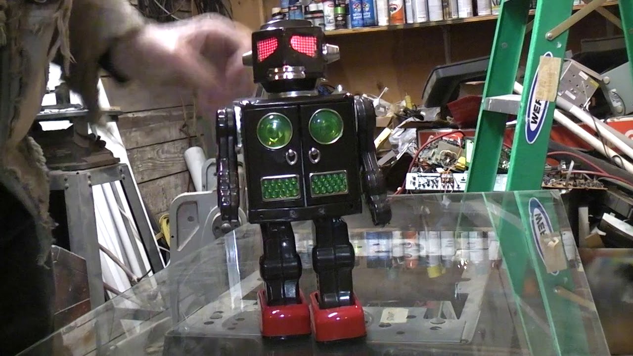 6 vintage toy robots in the COLD shop for repair. Demo