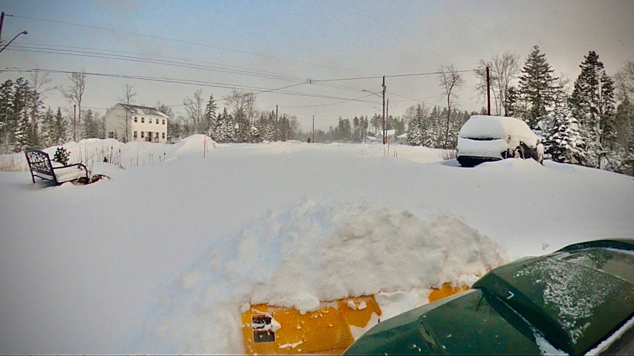 Snow Plowing Driveway After Nor’Easter With Side By Side UTV