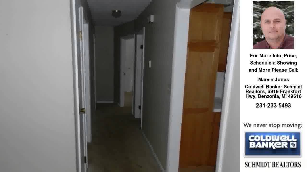 6793 River Street, Benzonia, MI Presented by Marvin Jones.