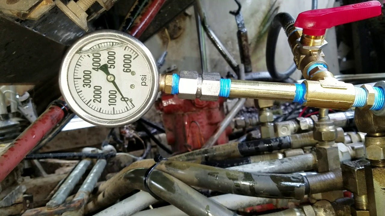 Takeuchi TB035 main hydraulic pump failure. (weak travel motor)