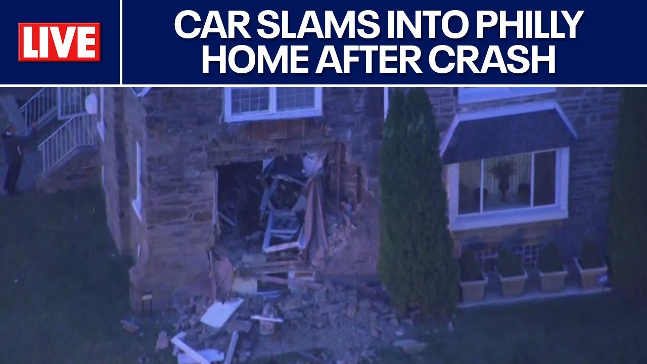 Car slams into Philly home after crash