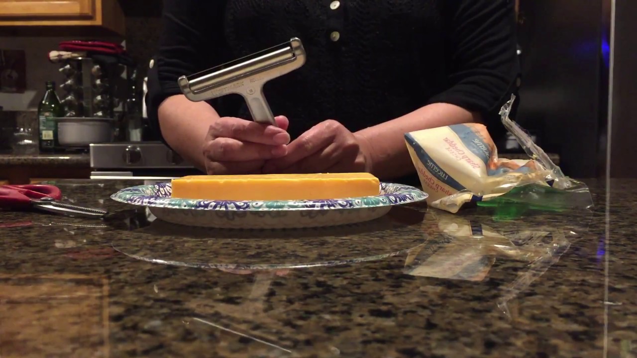 How to slice sharp cheddar cheese