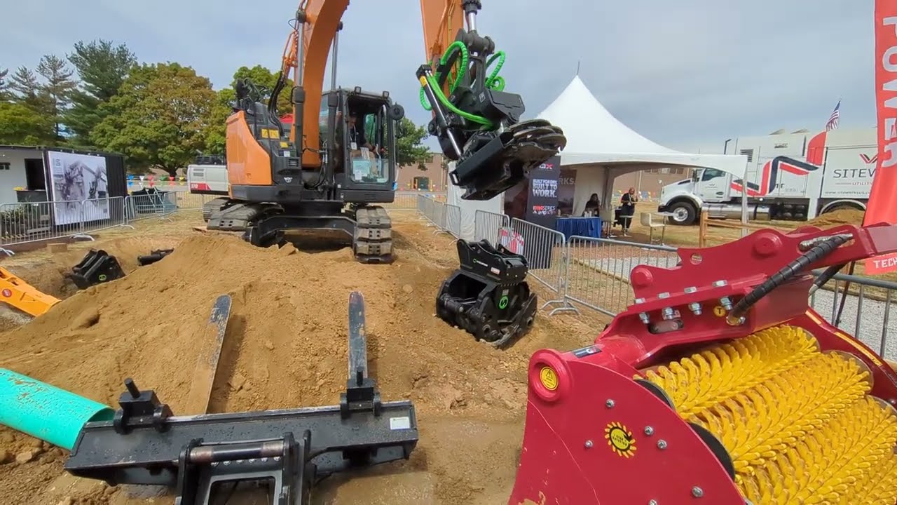 Coolest Excavator Attachment Ever! The Steel Wrist! Kentucky Utility Expo!