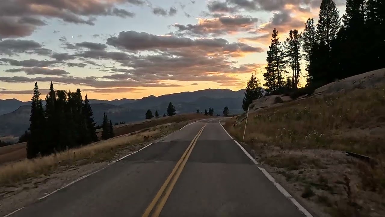 Driving Lower Beartooth Pass to Cooke City at sunset