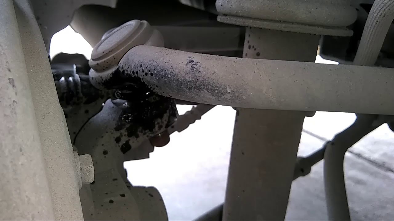 Retiro e Instalación Rótula Trasera Stratus 03