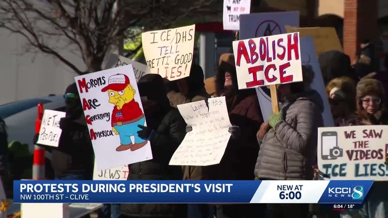 Protestors gather outside event center during President Trump's visit in Clive