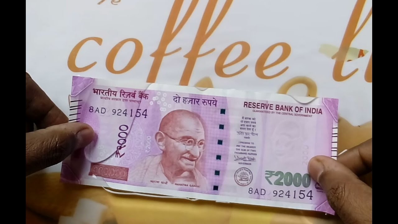 New 2000 Rupee Note Water Proof Test
