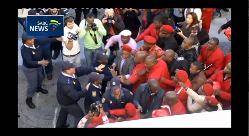 Scuffles between the police and EFF outside Parliament