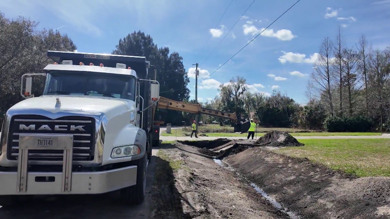 Ditch digging to alleviate flooding pits Titusville neighbor against neighbor
