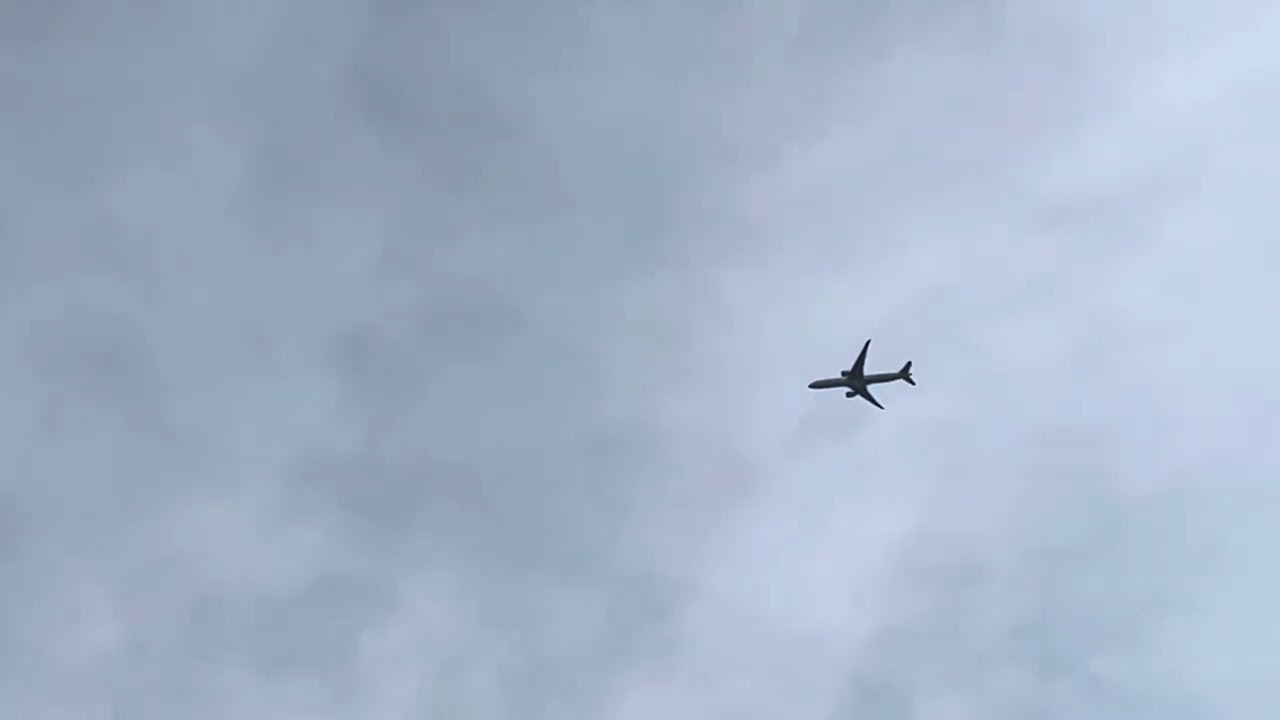 Air Canada Boeing 777-333(ER) (C-FIVM, AC840) departing YYZ over my house to FRA
