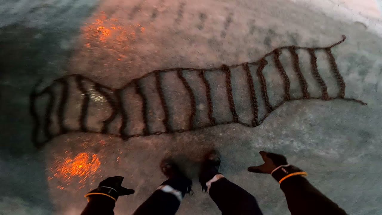 POV Putting chains on the truck and driving on ice-road in northern-Norway, Mercedes Actros