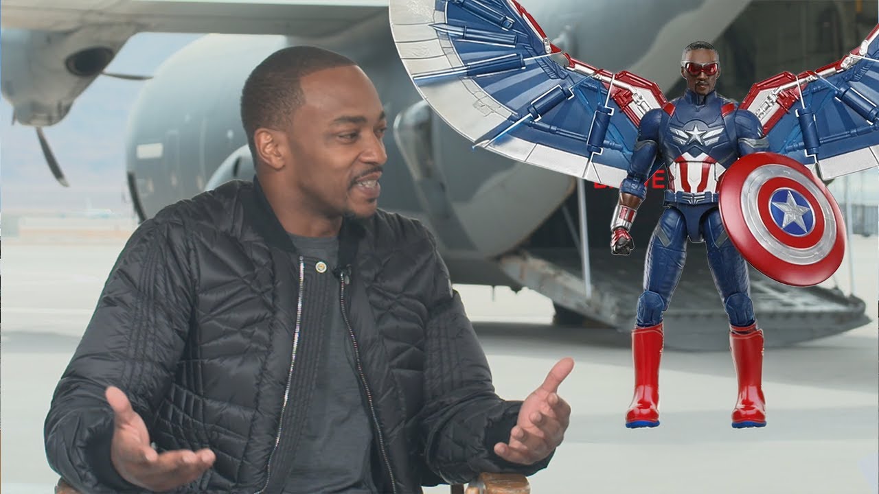 Anthony Mackie REACTS to Captain America Action Figure & Thanks His Teachers (Exclusive)