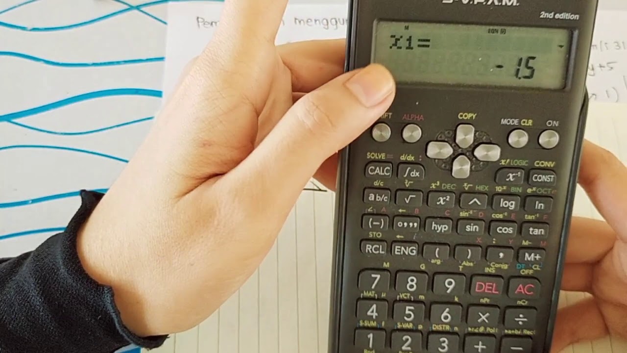 pemfaktoran menggunakan kaedah darab silang dengan bantuan calculator