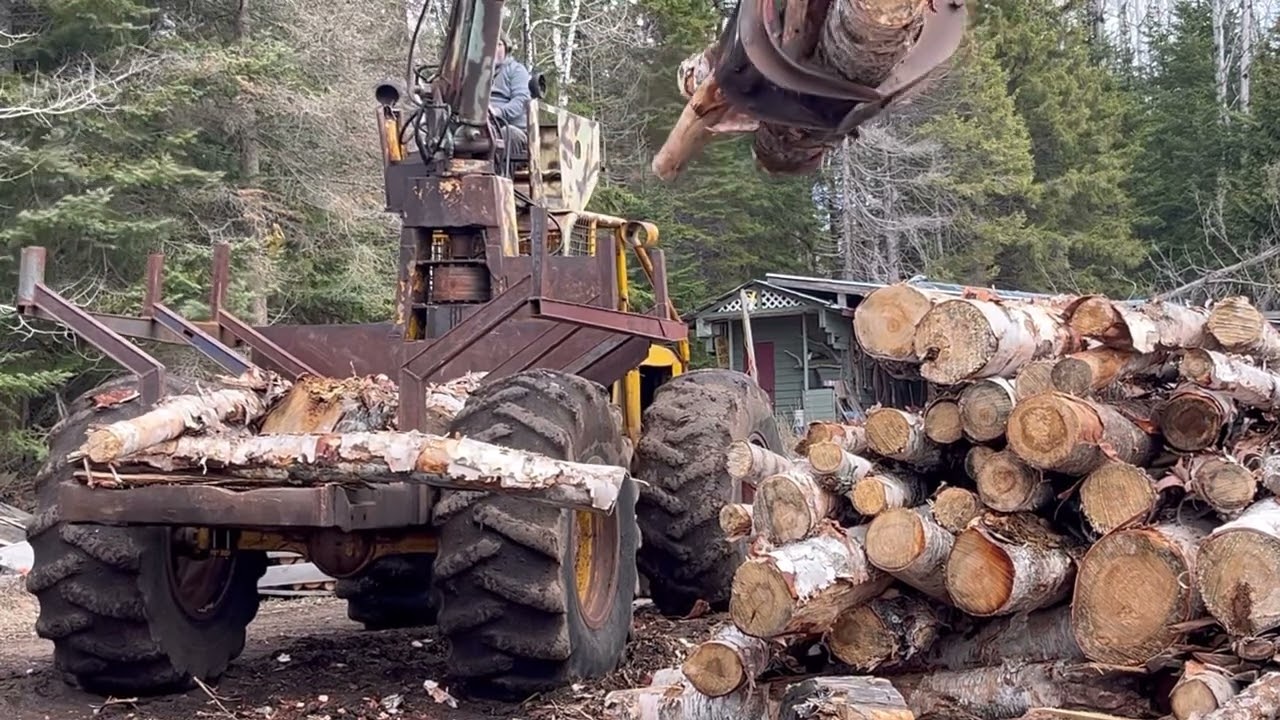 Tree farmer C5 forwarder getting firewood