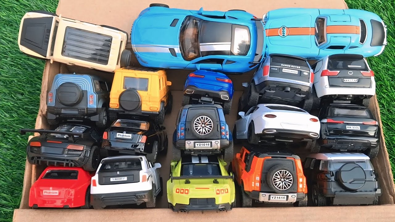 Box full of diecast cars |