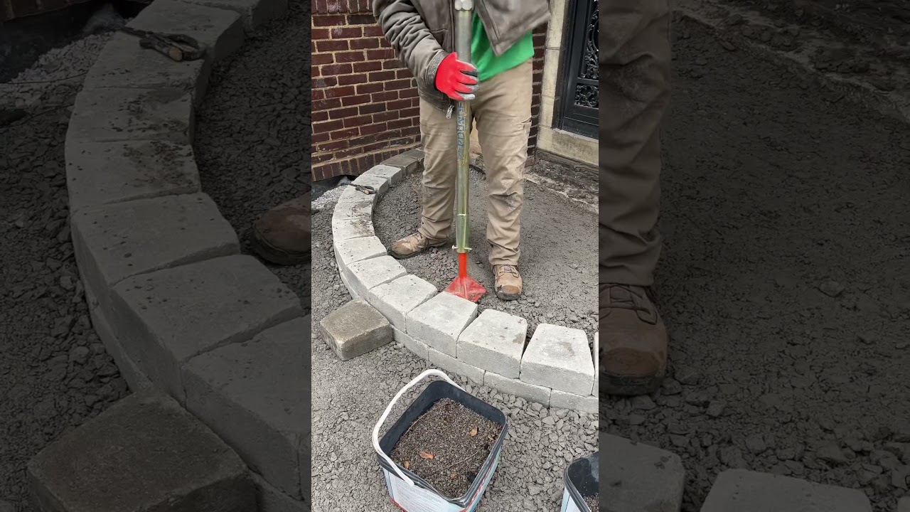 Hand tamping those tough to reach spaces. #compaction