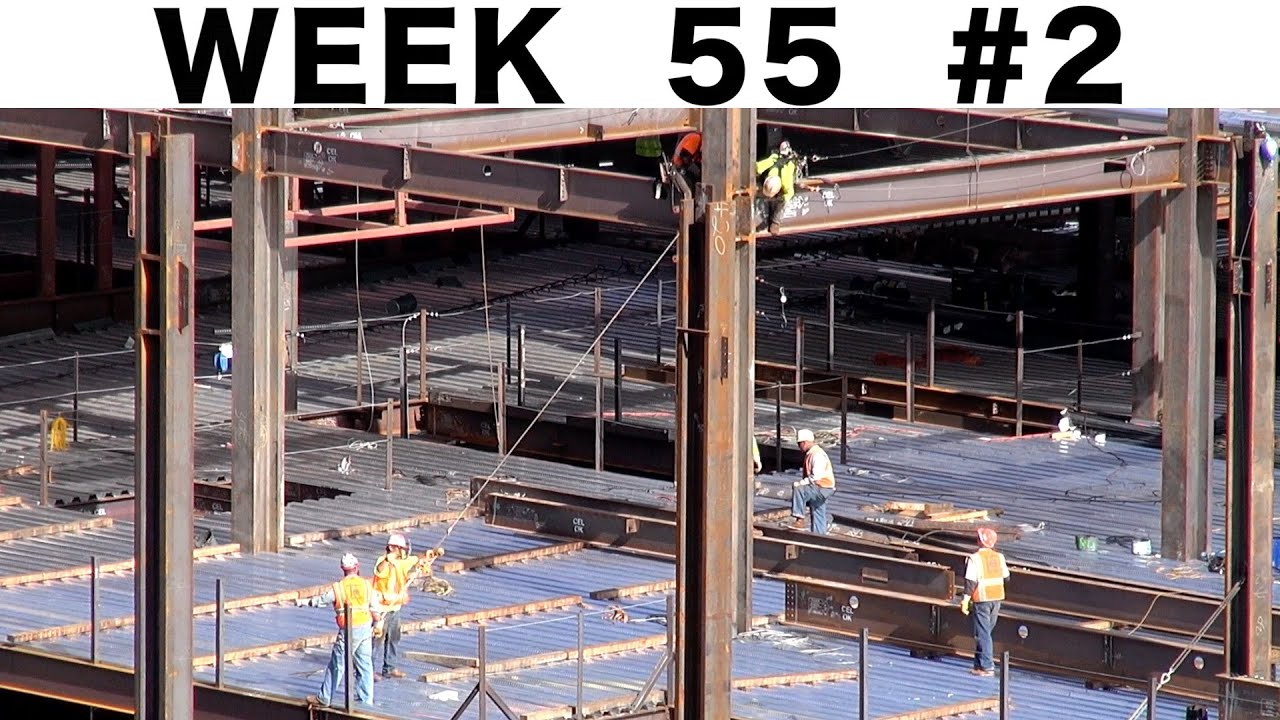 Ironworkers getting a stubborn I-beam to fit:  