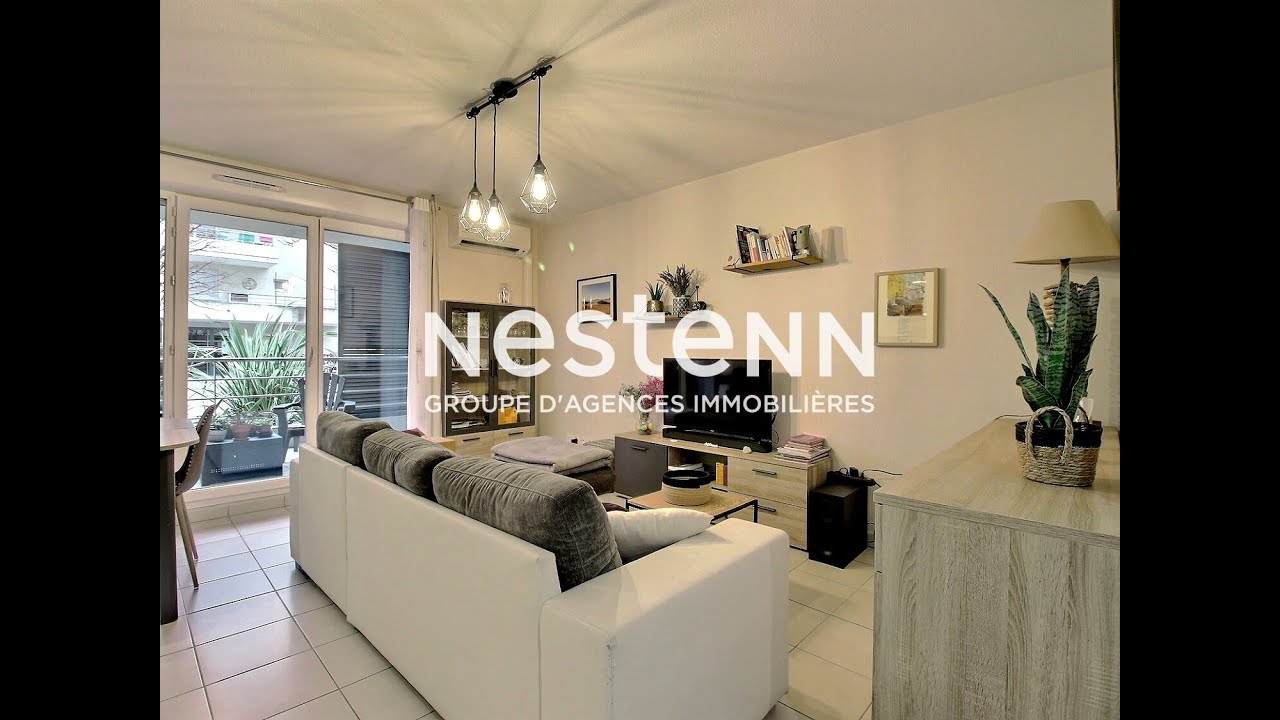 T3 d'environ 65m² en rez-de-chaussée avec terrasse et parking - Résidence sécurisée