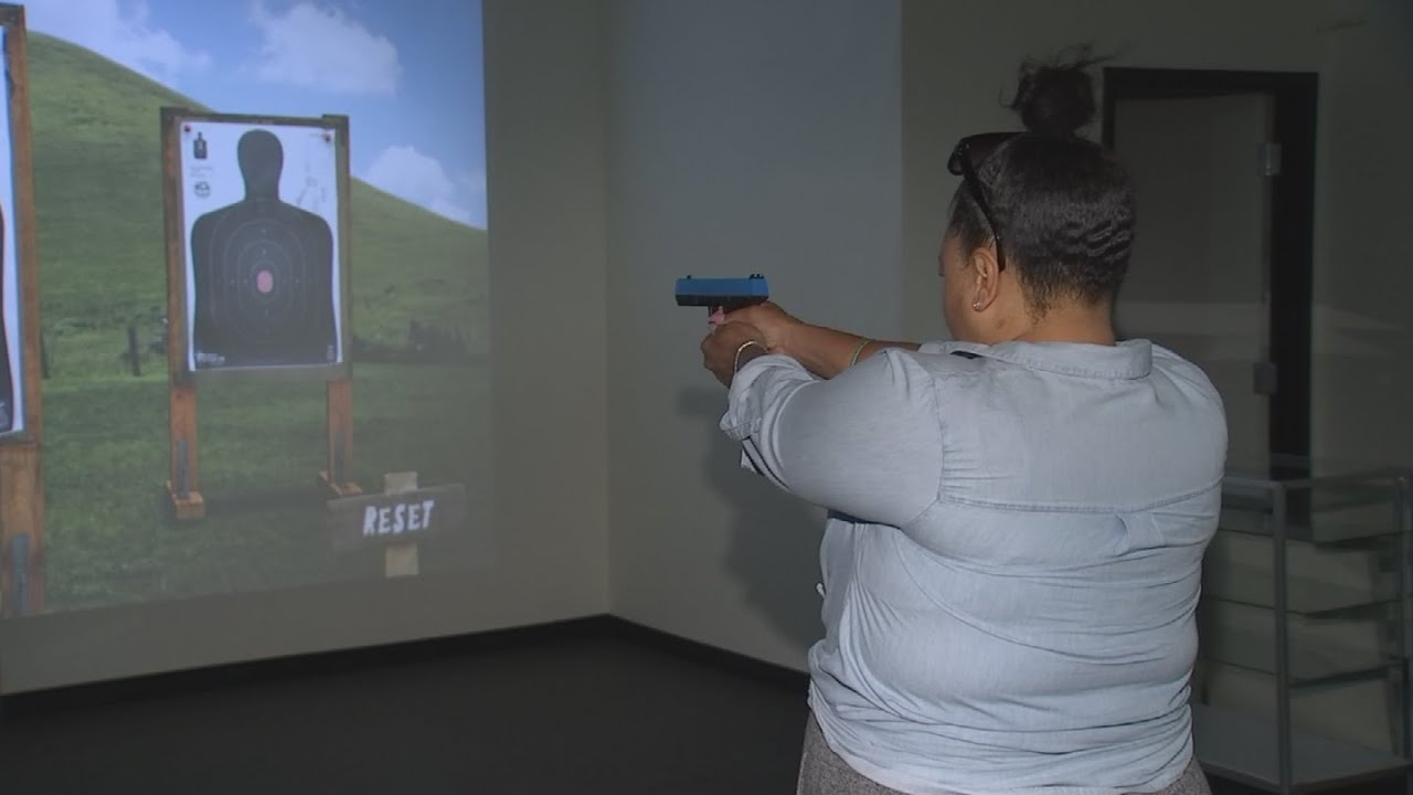 VIDEO: Women getting trained on how to shoot a gun