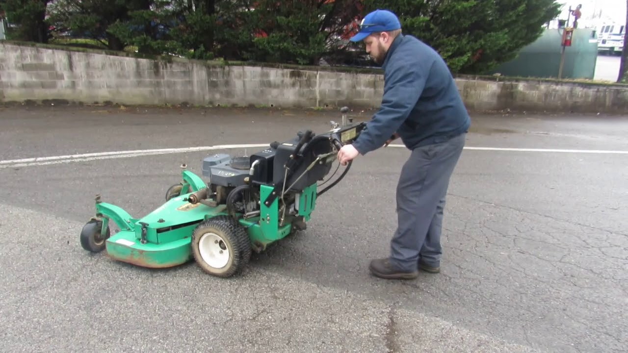 Lesco Walk Behind Zero Turn Mower | Compass Auctions & Real Estate