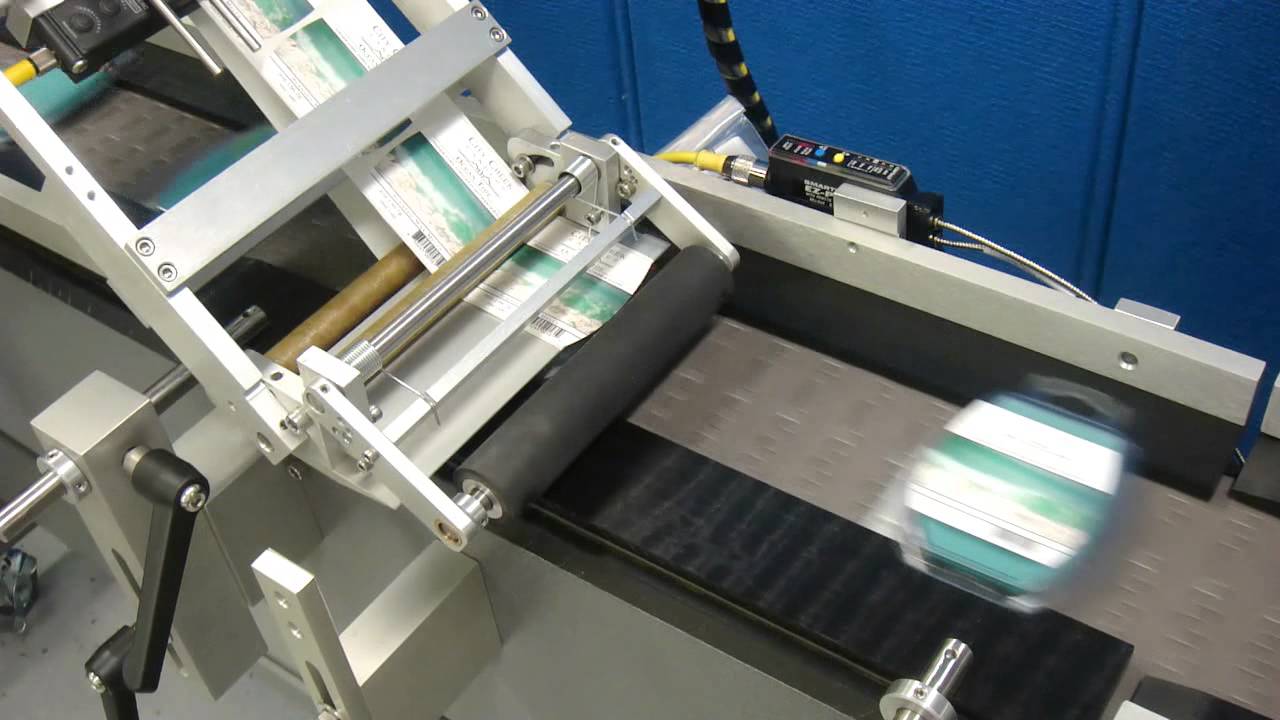 Wipe on Labeling with a custom lugged conveyor