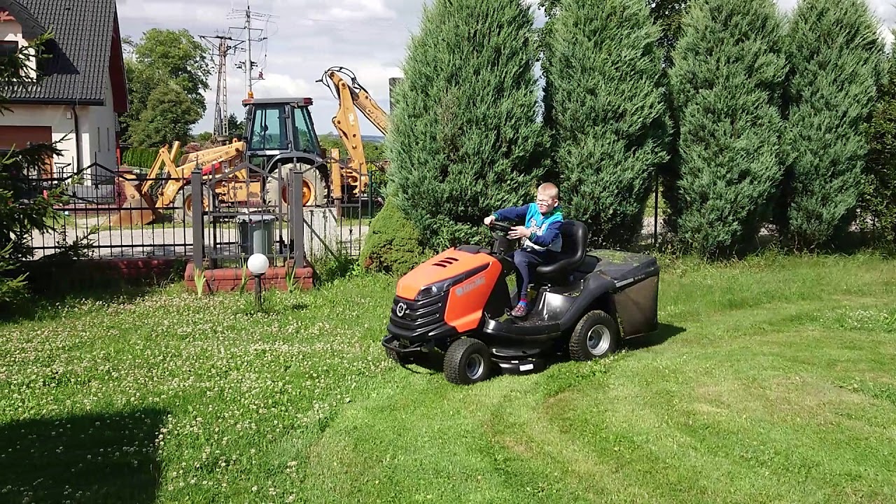 My son's first ride on Oleo-Mac 92/16 KH garden tractor