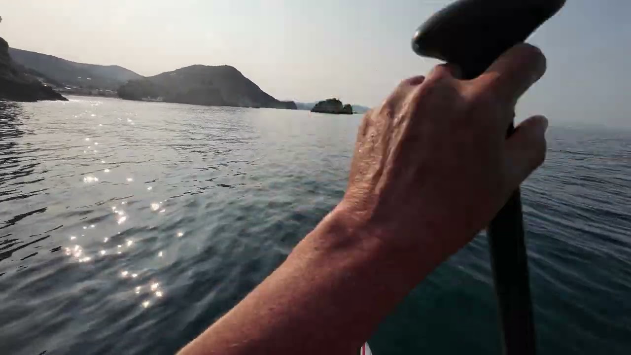 SUP boarding along the coast of Parga ,Greece