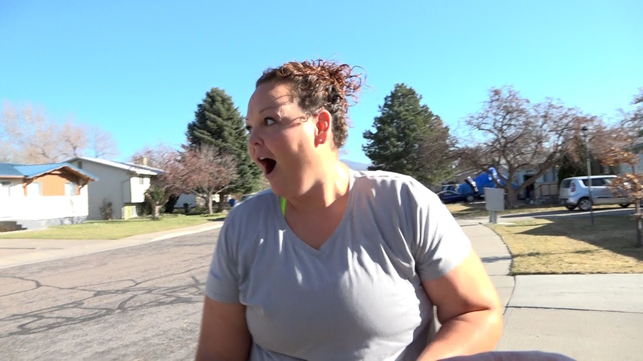 Mom putting up Christmas lights surprised with incredible Secret Santa gift