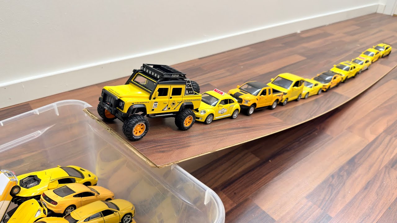 Bigger Sized Diecast Model Cars Sliding Down From The Slope