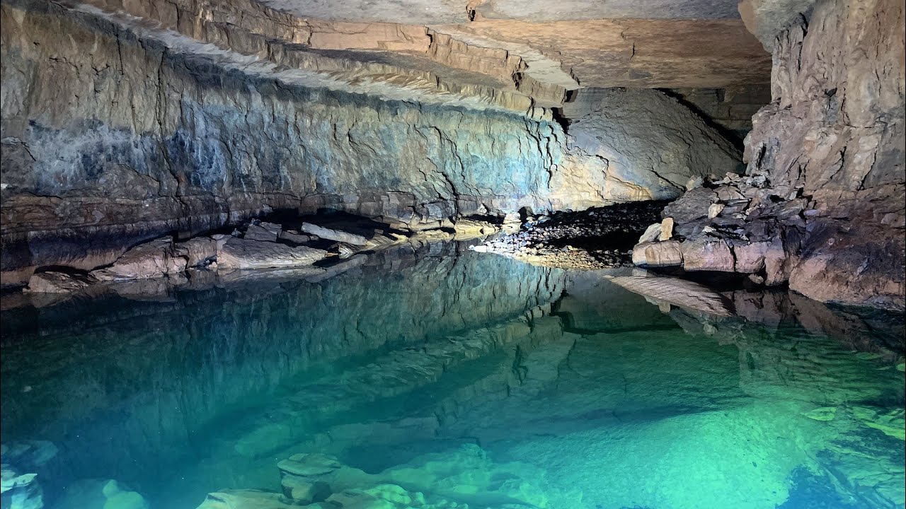 UNDERGROUND CANYON ENDS IN A 300 FOOT WATERFALL