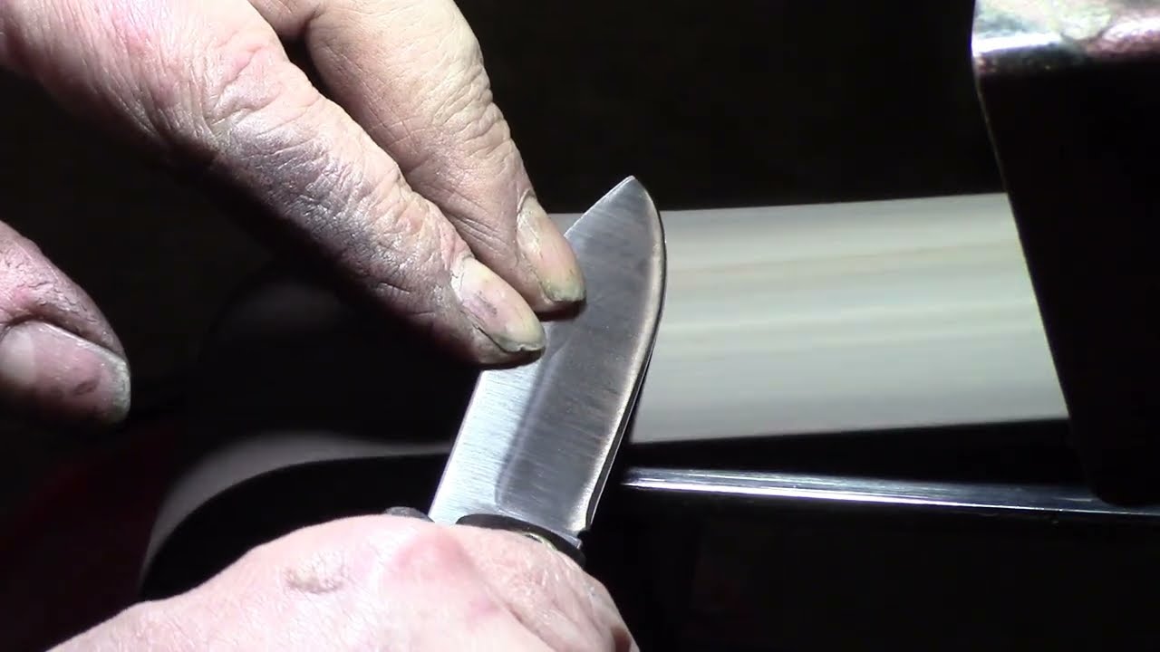 17)    Coltello a tre scrocchi    affilatura