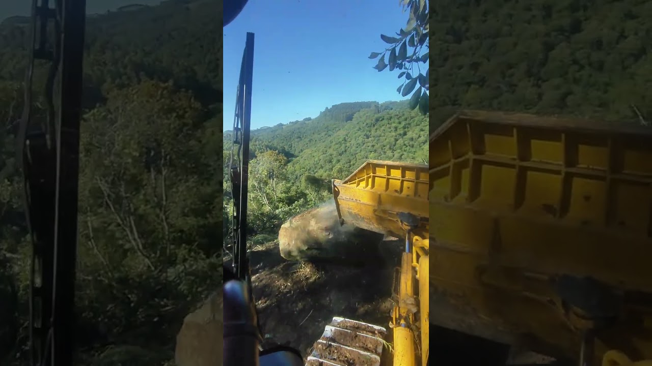 Trator de Esteira Depois da derrubada empurrando pedra e rebaixe! 