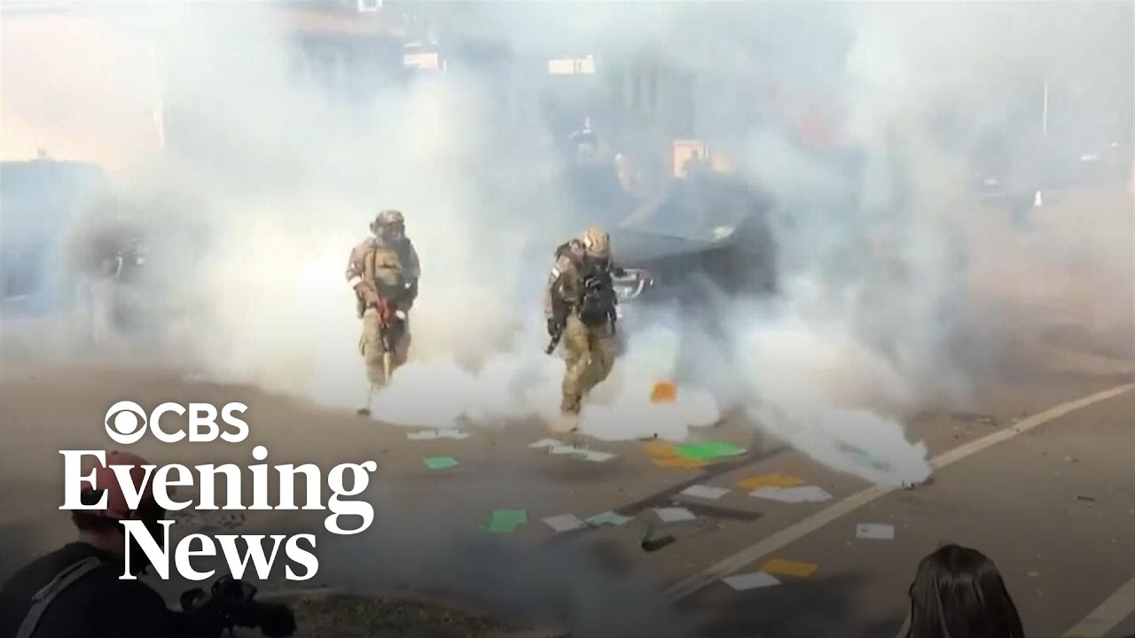 Protesters clash with immigration agents in Chicago